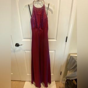 Magenta halter top gown, open back w/decorative tie cord.  Light beading at top